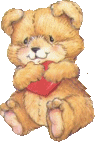 [ID: A light brown teddy bear hugging a red heart to its chest. End ID]