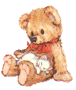 [ID: A light brown teddy bear with a red bow around its neck and a white kitten in its lap. End ID]